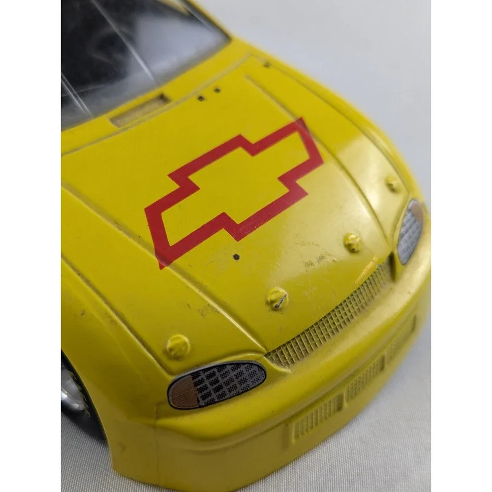 1996 Racing Champions Chevrolet BriCkyard 400 1:64 Monte Carlo Car Yellow